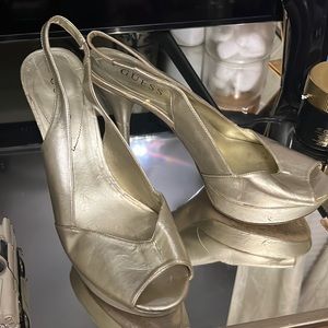 Used. Guess platform sling back heels